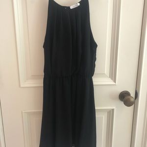 Black high neckline synched waist dress